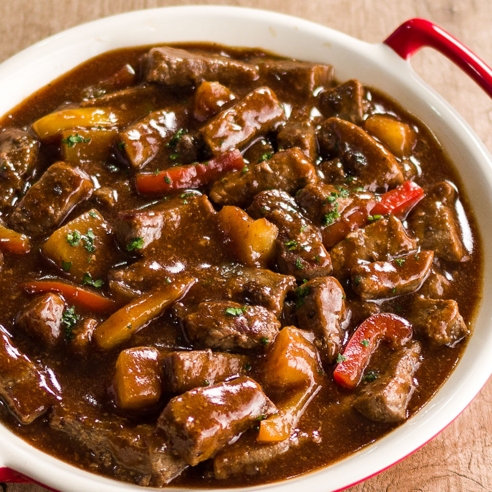 Receita de Tiras de coxão mole agridoce com pimentões