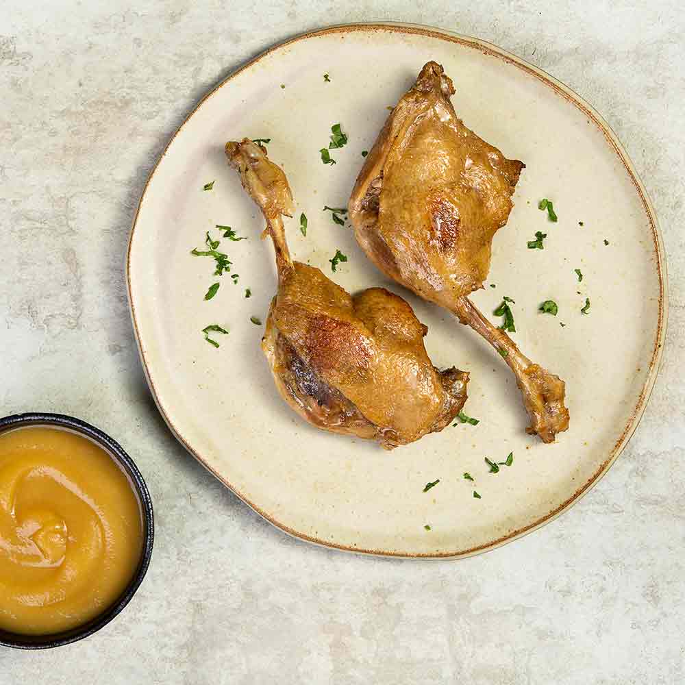 Receita de Coxa e sobrecoxa de pato assada com purê de maçã