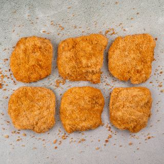 622505-file-de-coxa-e-sobrecoxa-empanada-baita_inn
